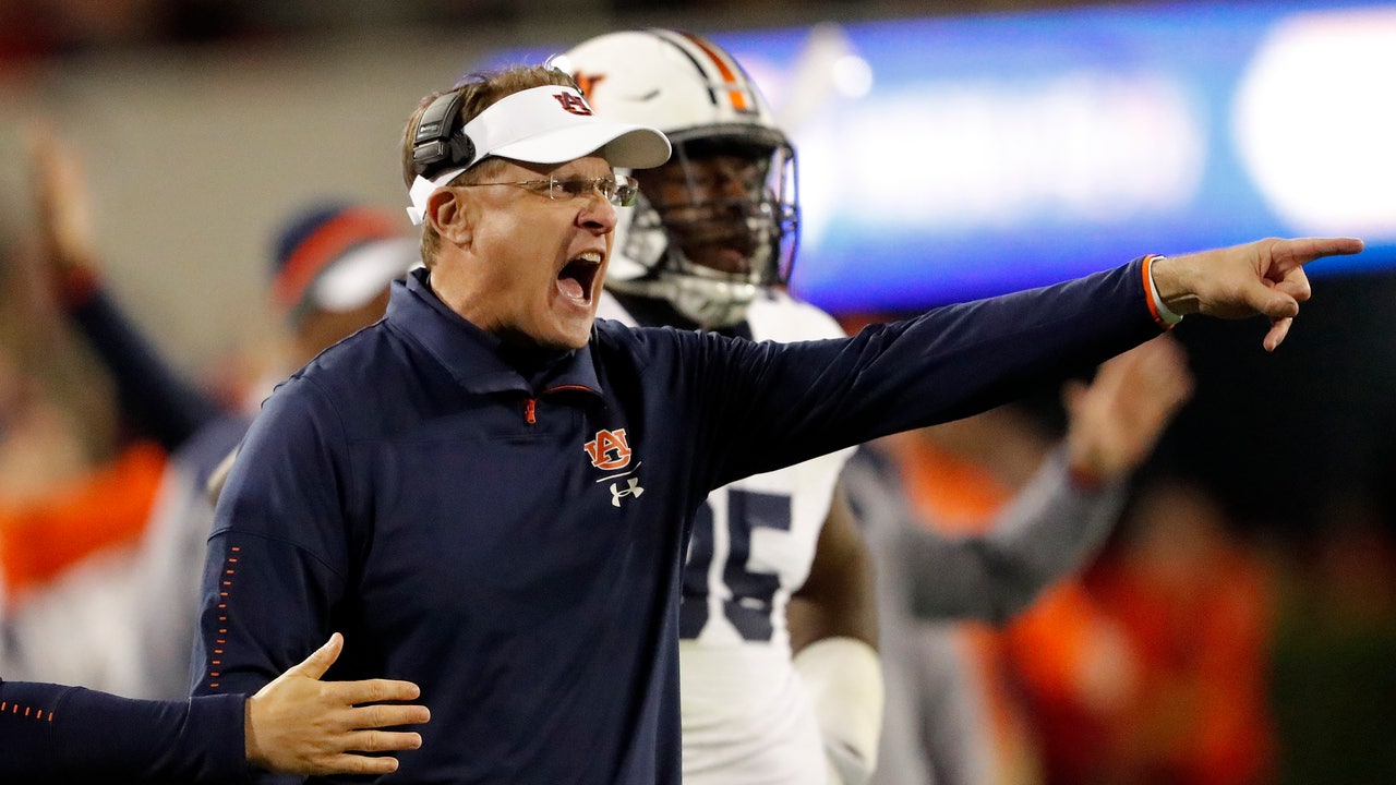 Auburn tries to regroup vs Liberty in between rivalry games